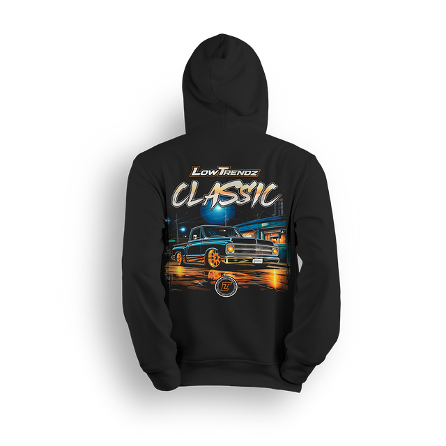 Classic Nights hoodie featuring a gold-wheeled Squarebody cruising under city lights with glowing reflections. Bold Low Trendz Classic lettering makes this hoodie a tribute to timeless builds and late-night rides in the custom truck scene.