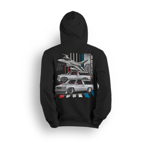 Hoodie featuring Mike García’s slammed 1996 Chevy Tahoe in red, white, and blue with a fighter jet flying overhead. Inspired by his StreetTrucks Magazine build, the Maverick hoodie combines Pro Touring style, bold detail, and street-ready stance for standout presence.