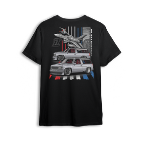 T-shirt featuring Mike García’s slammed 1996 Chevy Tahoe in red, white, and blue with a fighter jet flying overhead. Inspired by his StreetTrucks Magazine build, the Maverick t-shirt combines Pro Touring style, bold detail, and street-ready stance for standout presence.
