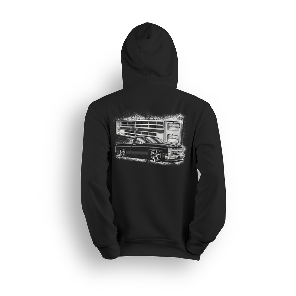 Hoodie featuring a black Squarebody C10 dropped low with a stylized illustration of its iconic front end in the background. Bold Chevy vibes, clean stance, and street-ready attitude make this hoodie a true nod to the custom truck scene.