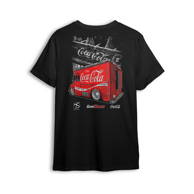 T-shirt featuring a slammed Coke delivery truck in front of a vintage soda crate backdrop. A Da Shop x Low Trendz collab, this t-shirt blends nostalgic style with custom truck attitude for true streetwear fans.
