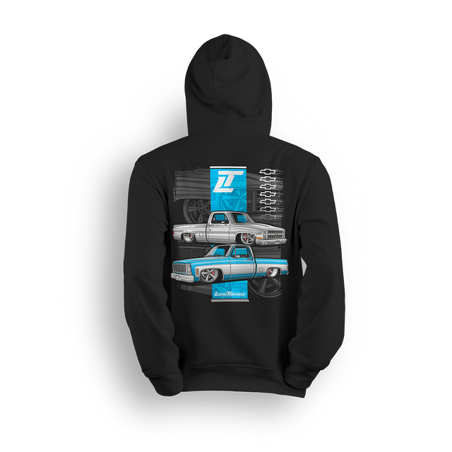 Square Body Royalty hoodie featuring a dropped and detailed classic Chevy C/K pickup cruising across a steel-blue vertical strip with ghosted wheels and stacked bowties. A bold tribute to square body dominance and timeless truck style.