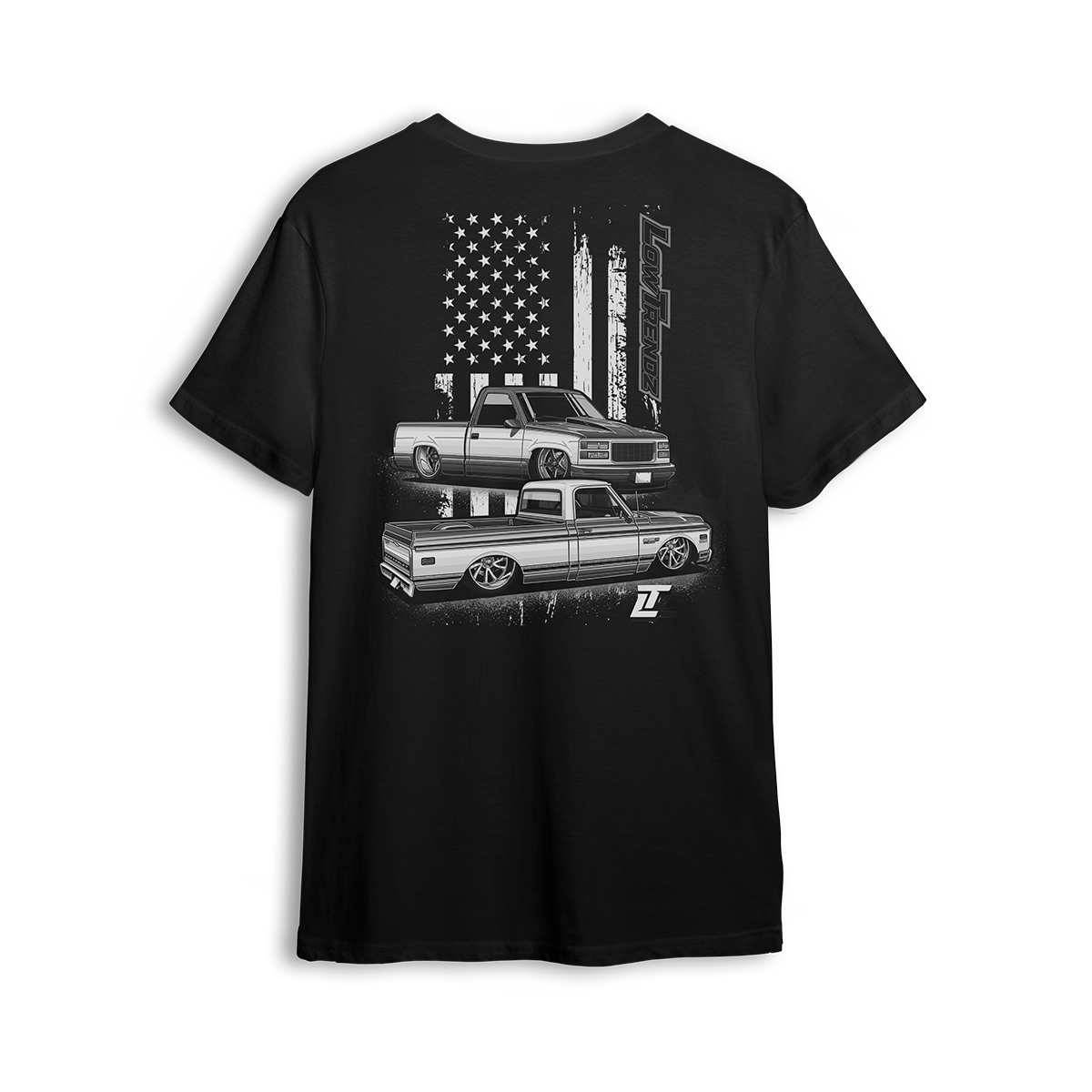T-shirt featuring a slammed C10 and OBS combo with a gritty American flag backdrop and bold Low Trendz branding. Blending old-school style with street flex, this t-shirt is built for true truck fans and show season vibes.