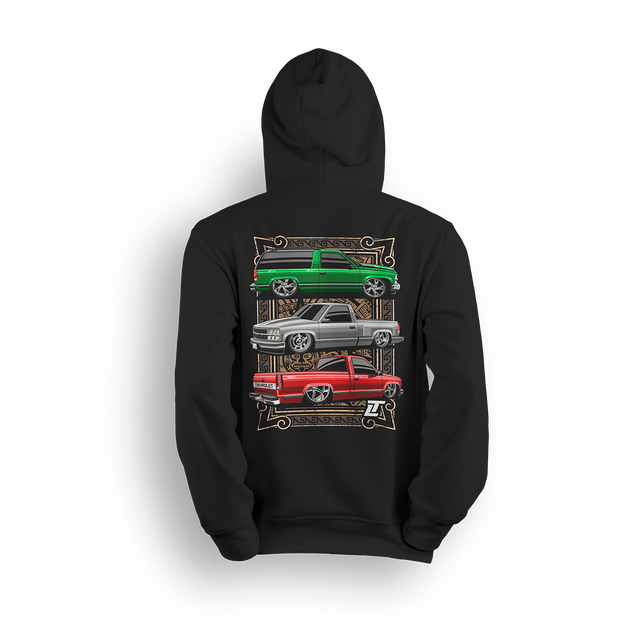 Hoodie featuring three clean Chevy OBS builds in green, white, and red over an Aztec-inspired backdrop. With a classic Tahoe and slammed single cabs, this hoodie honors cultura, chrome, and custom truck pride.