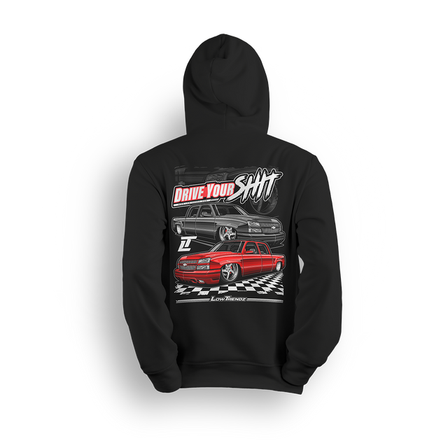 Hoodie featuring two slammed Silverados rolling on a checkered track floor with bold red-and-black styling. The “Just Drive Your Sh*t” hoodie calls out real show truck owners who drive what they build—no trailers, no excuses.