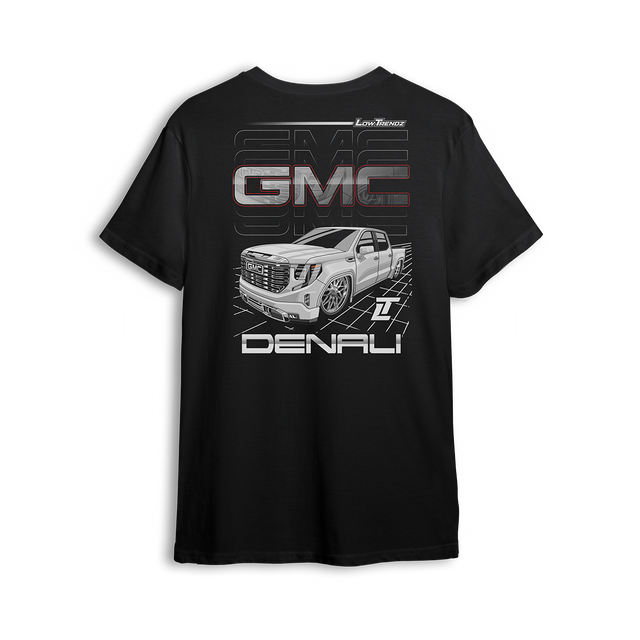 T-shirt featuring a slammed GMC Denali with bold grille and clean stance, illustrated over a sleek grid backdrop. The Arctic Denali t-shirt blends full-size luxury with street style for a standout look in the custom truck scene.