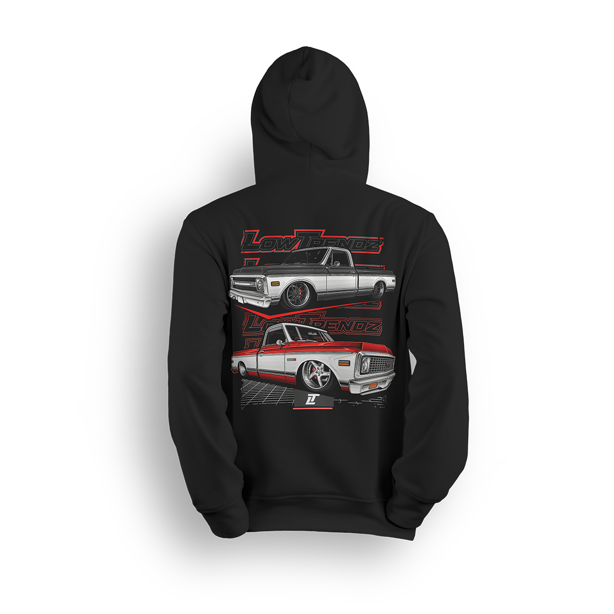 Hoodie featuring two slammed Chevy C10s—one silver, one red and white two-tone—laid out over a grid floor with a layered Low Trendz backdrop. The Two-Tone Royalty hoodie blends vintage muscle with custom show truck style for builders who keep it classic, not basic.