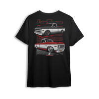 T-shirt featuring two slammed Chevy C10s—one silver, one red and white two-tone—laid out over a grid floor with a layered Low Trendz backdrop. The Two-Tone Royalty t-shirt blends vintage muscle with custom show truck style for builders who keep it classic, not basic.