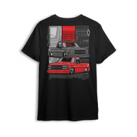 T-shirt featuring two slammed OBS Chevys in black and red over a bold tri-panel backdrop with a vertical CHEVROLET graphic and red bowtie. The Redline Revival t-shirt is a high-impact tribute to iconic Chevy style and custom truck lifestyle.