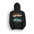 Hoodie featuring two slammed Chevy C10s in orange/white and mint/white two-tone colorways, laid out over a modern grid with layered Low Trendz branding. The Two-Tone Throwback hoodie blends vintage Chevy style with a clean, show-ready stance.