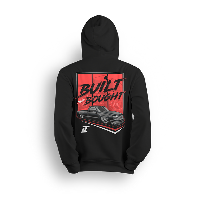 Hoodie featuring a fully dropped black Chevy Silverado with tucked wheels and bold “Built Not Bought” lettering across a red backdrop. This hoodie honors hands-on builders, late-night wrenchers, and the self-made hustle behind every custom ride.
