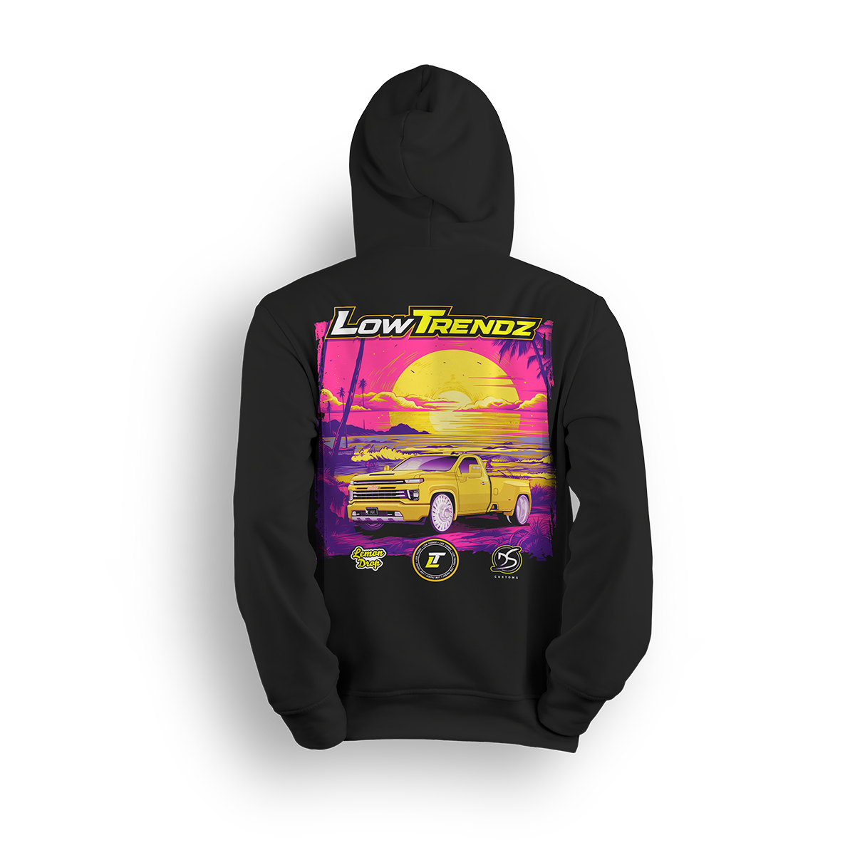 Hoodie featuring a slammed yellow Silverado baby dually set in a neon sunset with palm trees, purple tones, and golden glow. The Lemon Drop hoodie, a Da Shop x Low Trendz collab, brings tropical vibes and summer-style flex to the custom truck scene.