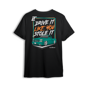 T-shirt featuring a slammed teal Chevy Silverado with a bold street stance and retro-style typography reading “Drive It Like You Stole It.” Set on a premium black tee with vibrant colors, this t-shirt captures loud custom energy and lead foot attitude.