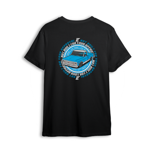 T-shirt featuring a slammed blue  Chevy C10 with bold wraparound text reading “NOT BUILT FOR YOUR APPROVAL.” A statement piece for builders who break the rules and rep their ride their way.