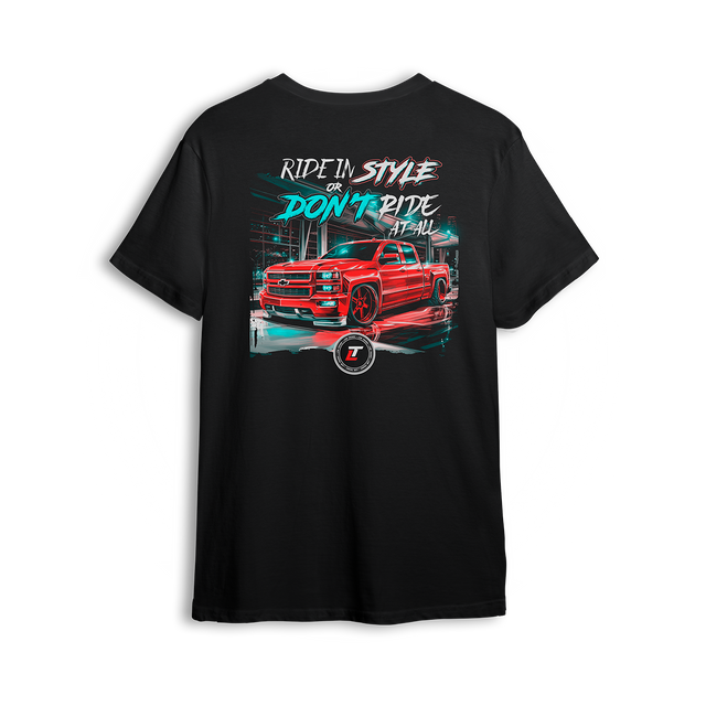 T-shirt featuring a fire-red slammed Chevy with glossy black wheels under city lights, accented by neon strokes and bold urban glow. “Ride in Style or Don’t Ride at All” text up top makes this t-shirt a statement for bold builders and late-night cruisers.