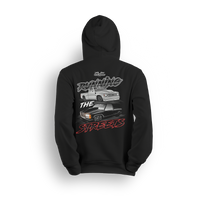 Hoodie featuring a slammed silver C10 and murdered-out OBS truck in a bold drag-ready layout with burnout marks and street-style font. The Running the Streets hoodie captures boosted attitude, full-send energy, and late-night racing vibes.