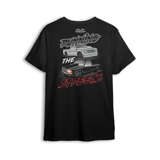 T-shirt featuring a slammed silver C10 and murdered-out OBS truck in a bold drag-ready layout with burnout marks and street-style font. The Running the Streets t-shirt captures boosted attitude, full-send energy, and late-night racing vibes.