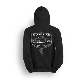 Hoodie featuring a slammed Chevy truck running static, framed in a retro-style badge with pinstripe accents and bold “Static” lettering. The Static hoodie is a raw, no-air statement piece for static riders who drag frame and stay planted.