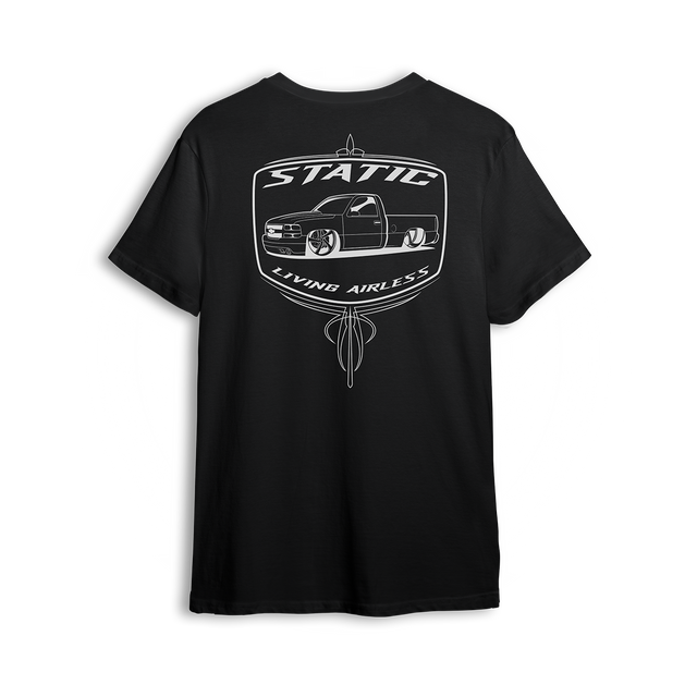 T-shirt featuring a slammed Chevy truck running static, framed in a retro-style badge with pinstripe accents and bold “Static” lettering. The Static t-shirt is a raw, no-air statement piece for static riders who drag frame and stay planted.