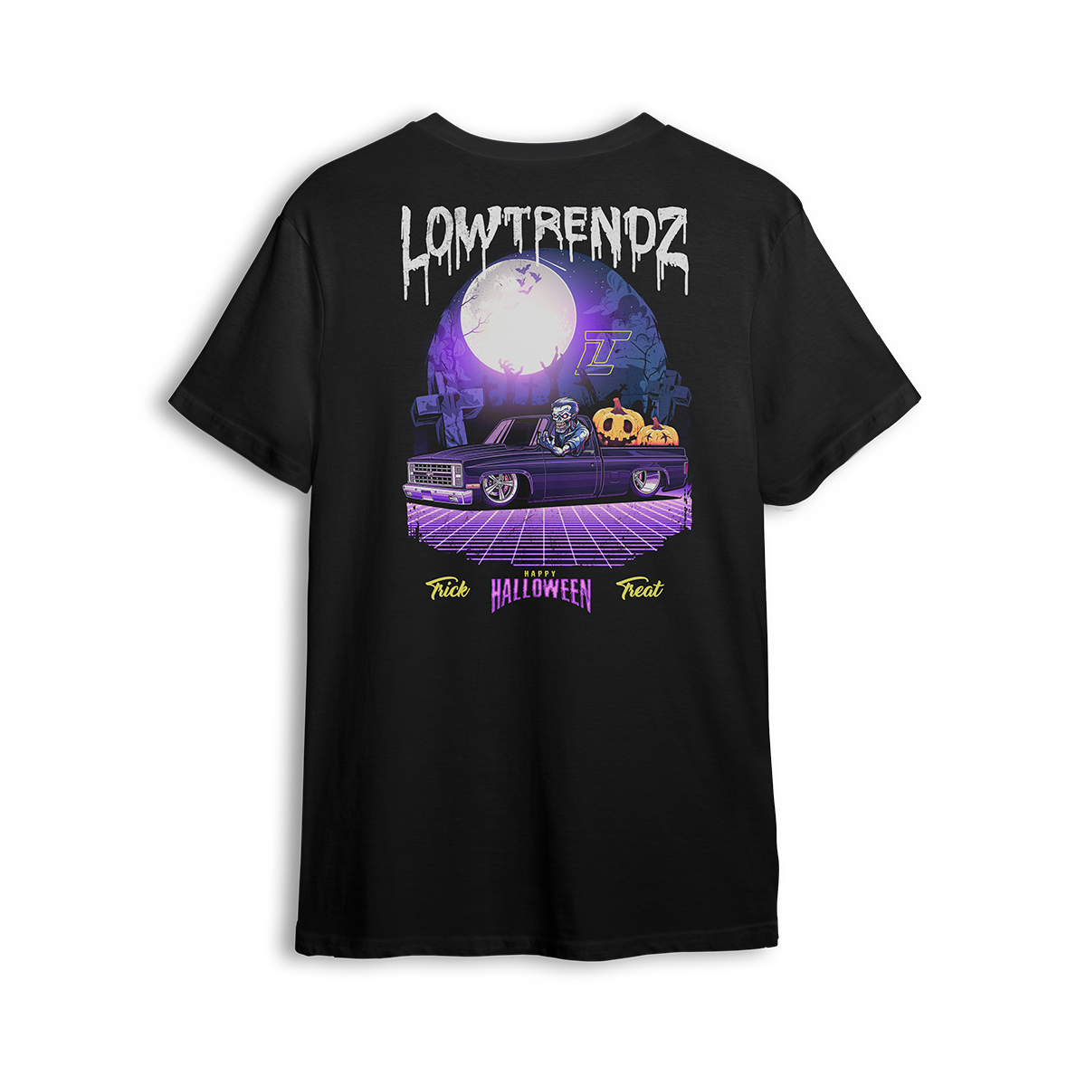 Halloween t-shirt featuring a slammed Squarebody in a graveyard at night with a full moon and skeleton behind the wheel