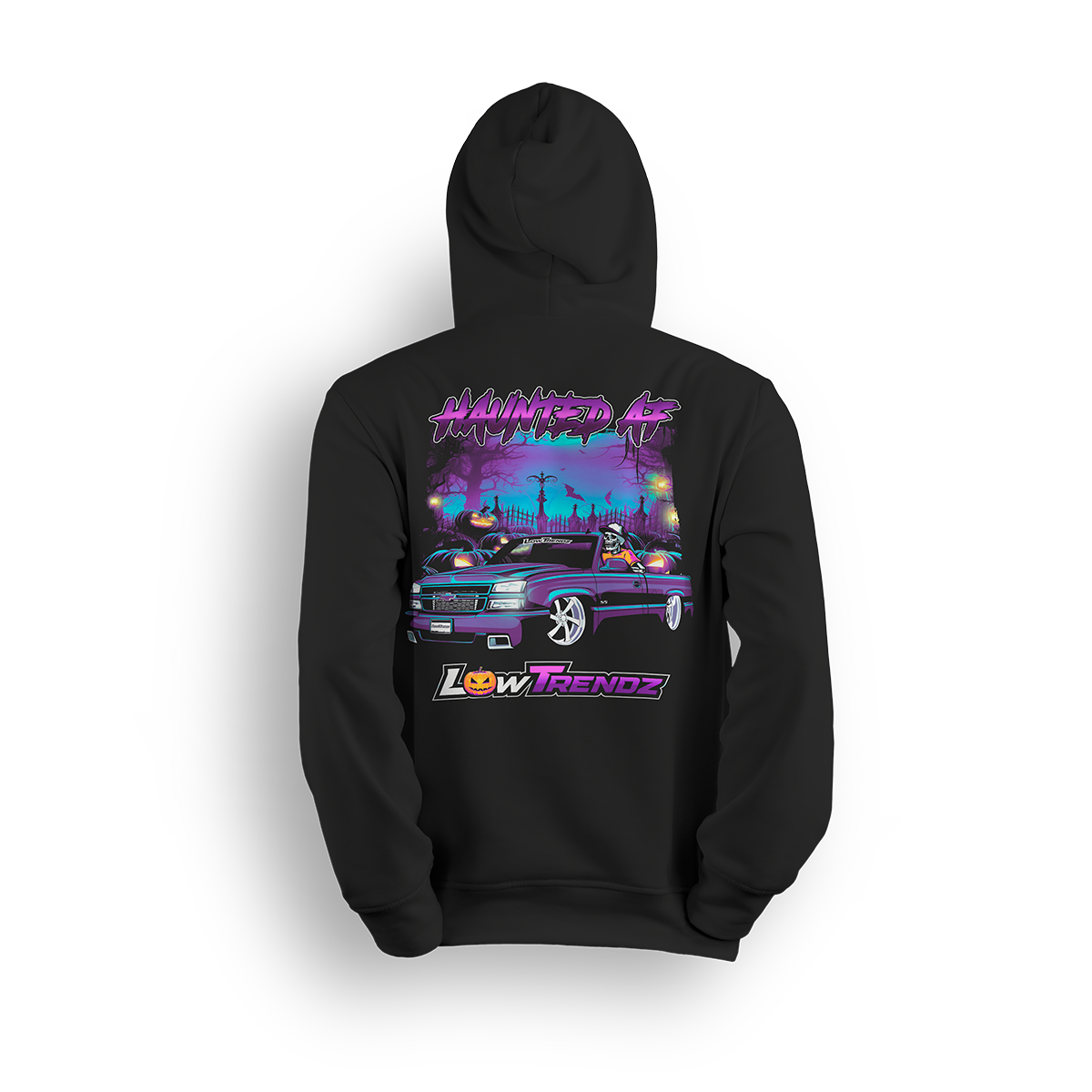 Black hoodie with spooky Halloween design featuring slammed Chevy Silverado in graveyard with jack-o-lanterns and skeleton reaper