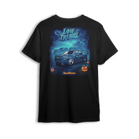 Halloween 2025 t-shirt featuring a slammed Chevy truck, glowing jack-o’-lanterns, and foggy haunted artwork by Low Trendz